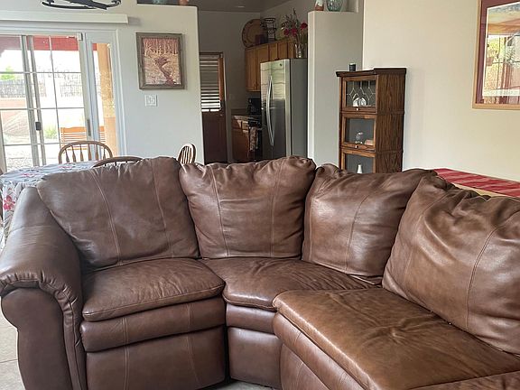 Sectional couch with 2 recliners and full sized sleeper.