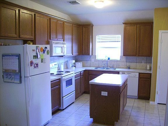 Beautiful Island Kitchen with 42-in. upper cabinets