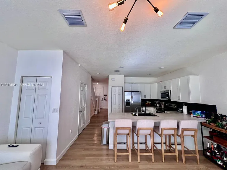 10939 W 32nd Ln — Photo 7