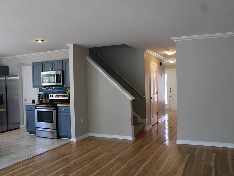 Family room with seamless flow to kitchen and other areas