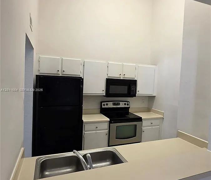 2880 N Oakland Forest Dr #214 — Photo 9