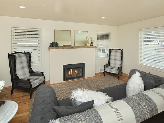 Custom mantle with remote control gas fireplace