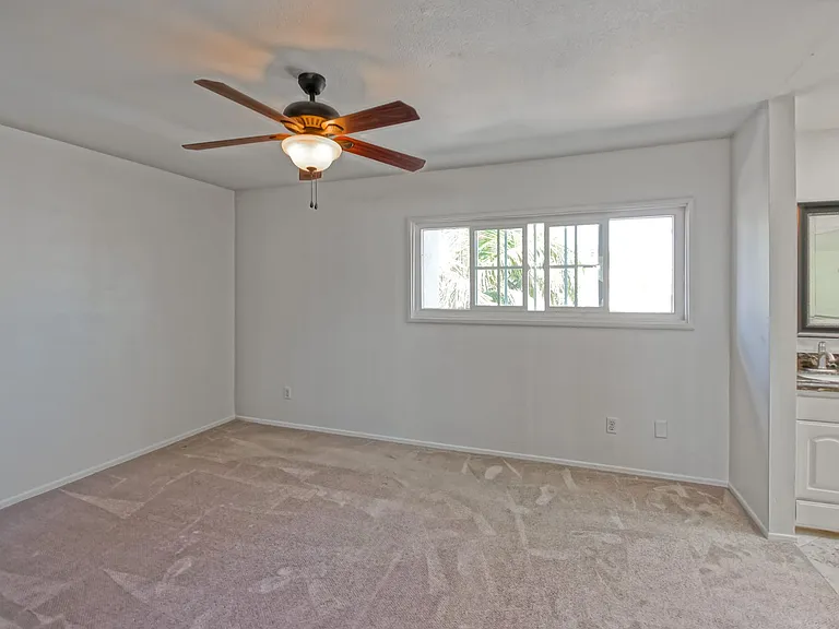 7148 Island Village Dr — Photo 40