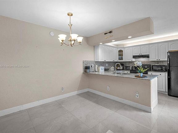 4th image of 11886 SW 8th Ct #11886