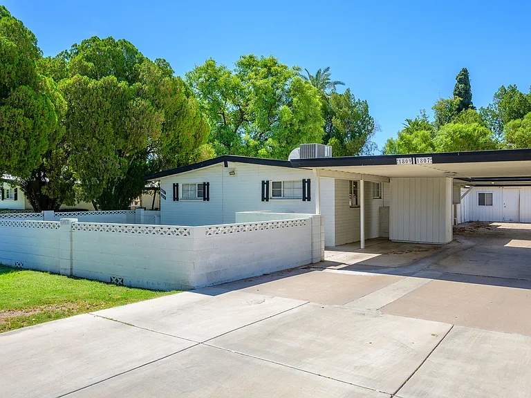 Street view of unit & carport