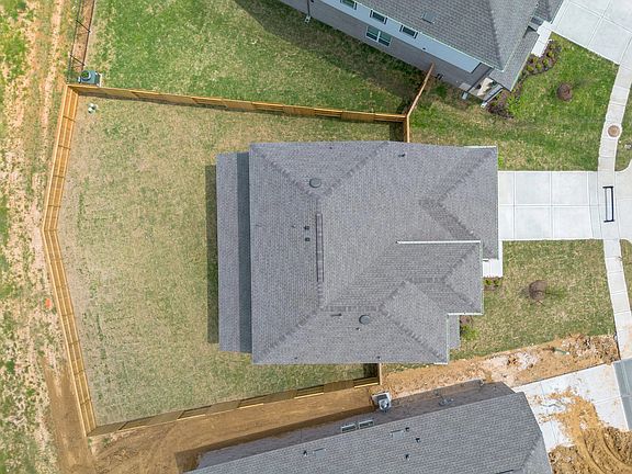 An aerial view of your lot with an oversized backyard.