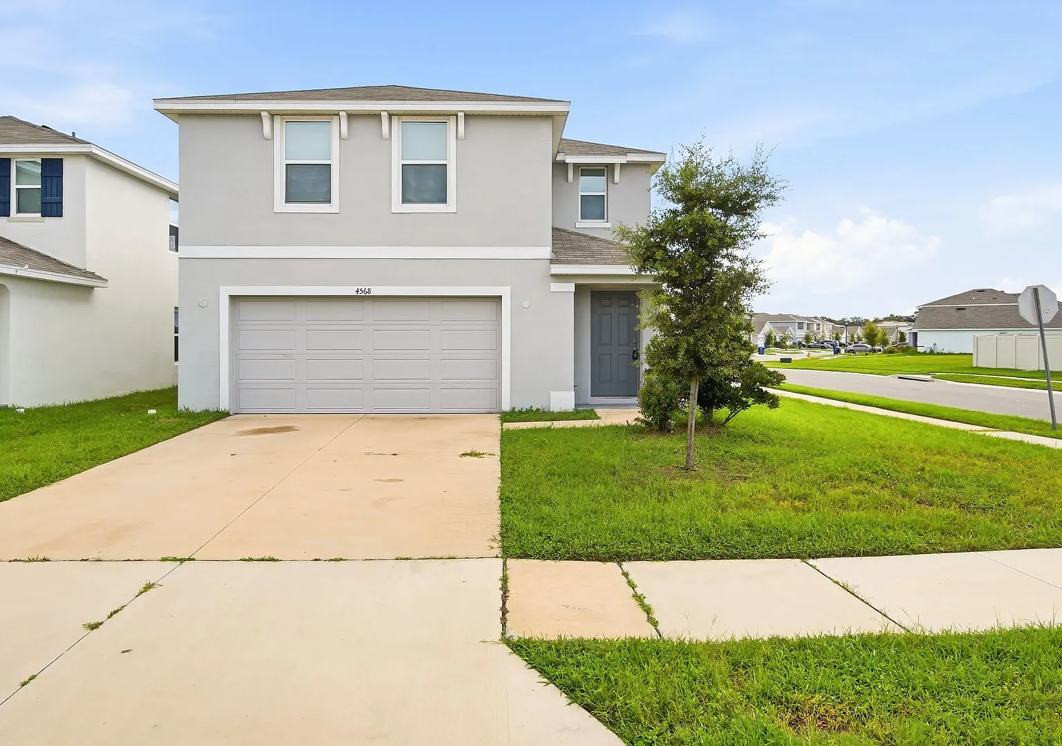 Spacious 4-Bedroom Home with Open Floor Plan, 2-Car Garage & Community Pool — Photo 1