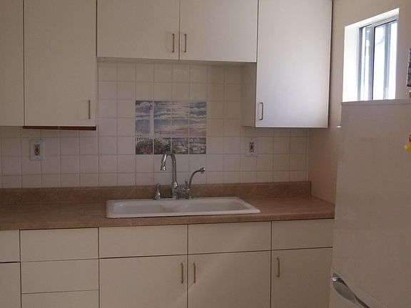 Ceramic Tile Mural in Kitchen.