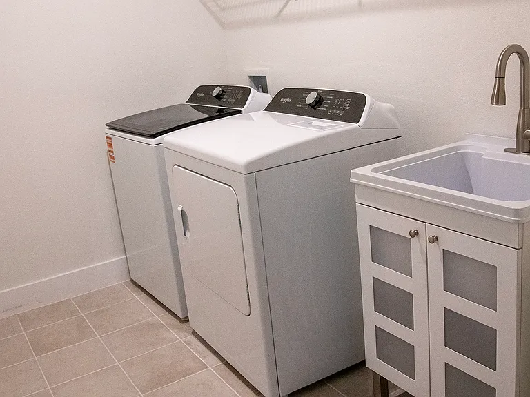 Laundry room is 12' long by 7' wide