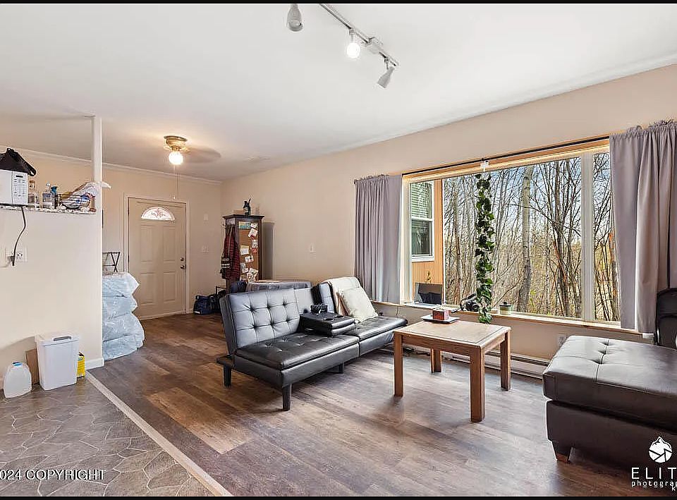 Kitchen view of living room (unit is unfurnished)