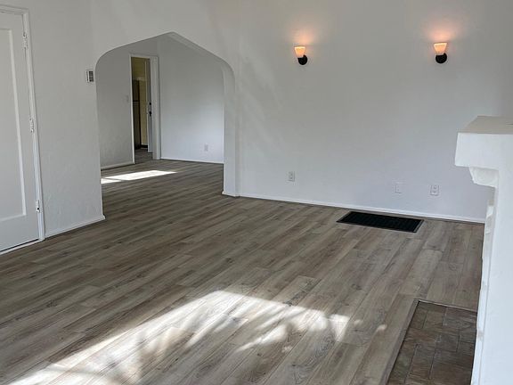 Archway from living room to dining room