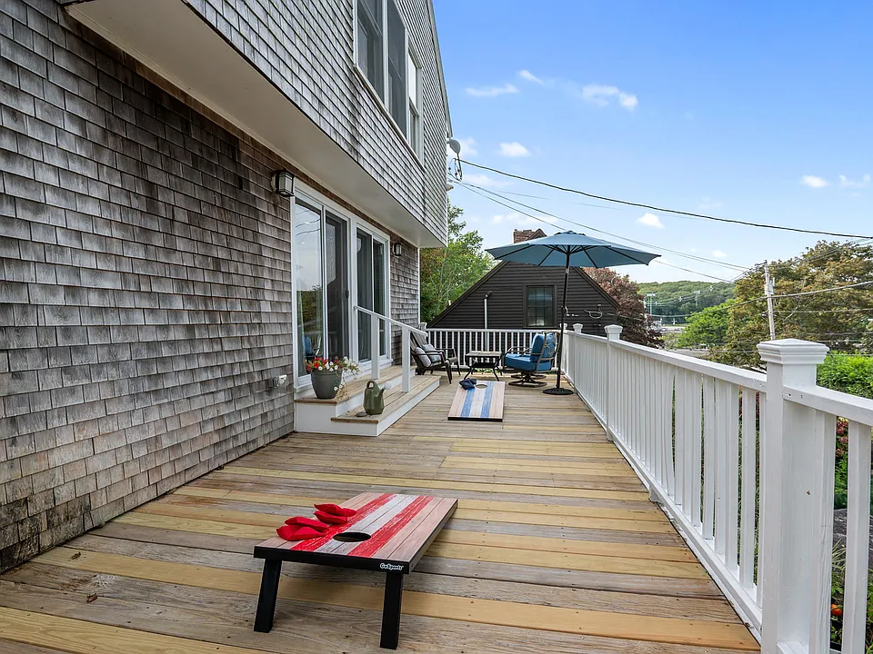 Corn hole included and outdoor seating