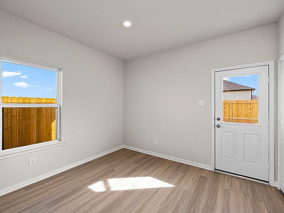Dining room with a door to the backyard