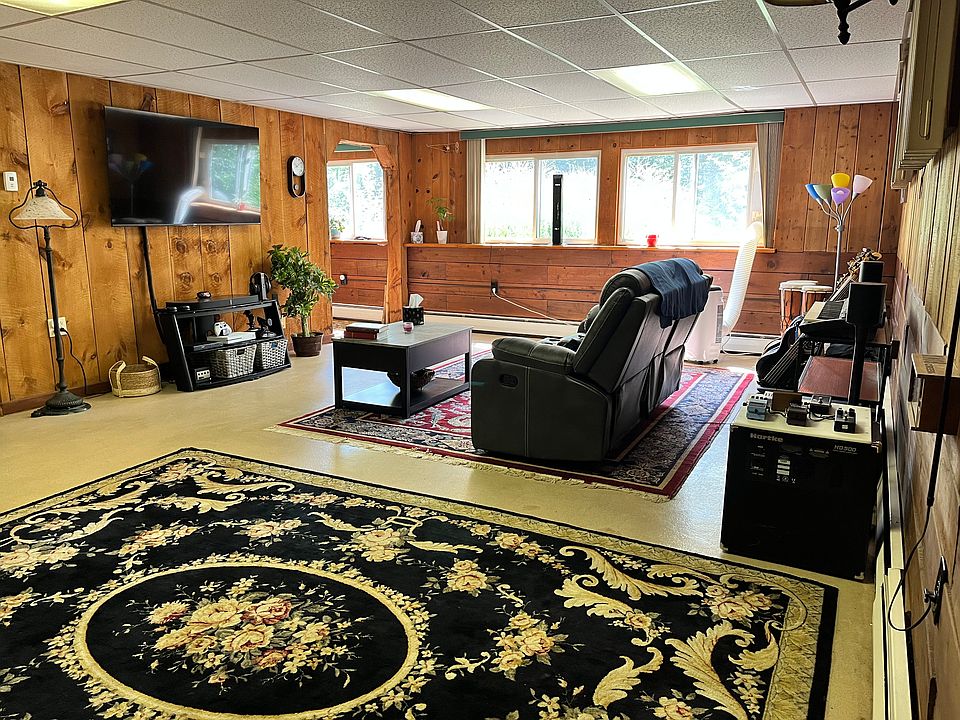 Living room from Fireplace wall. Very roomy. Partially furnished,