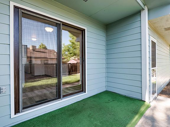 Sliding door and patio large enough for chairs and small beverage table