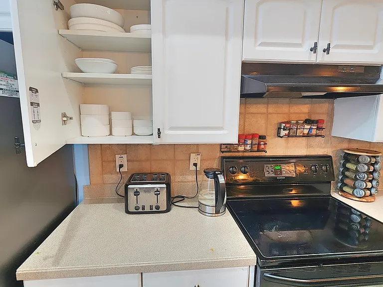 Lots of storage space and kitchen utensils.