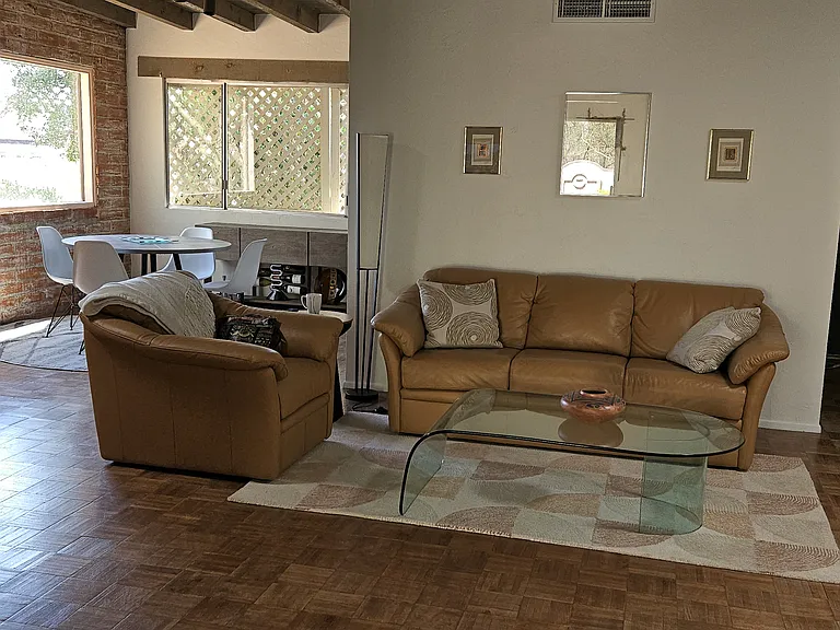 Living room opens to dining area.