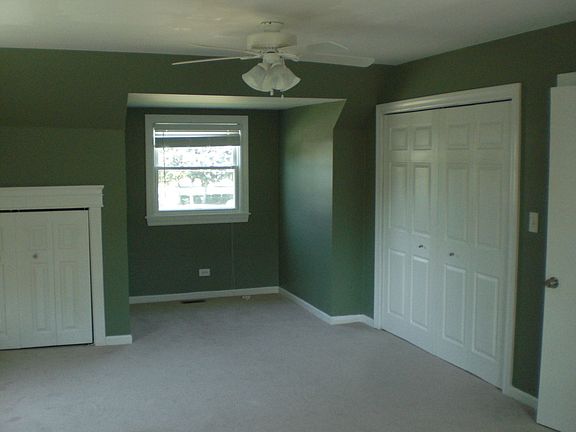 Half of one of the upstairs bedrooms (the are identical size/shape)