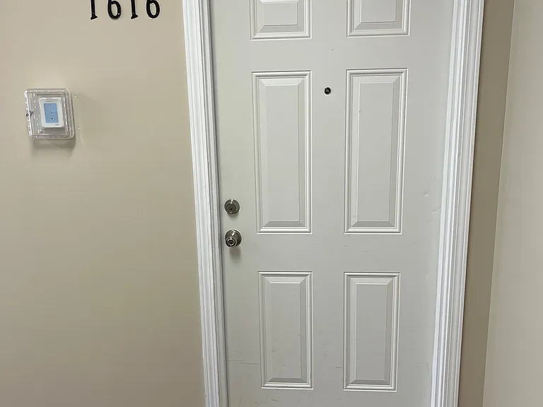 Condo Entry From Locked Hallway