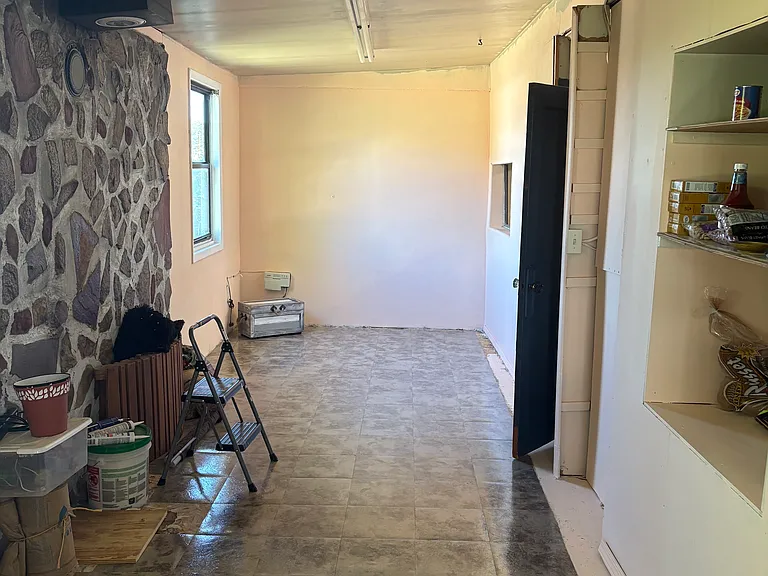 Back room furniture storage , etc/ pantry to be used for storing canned goods