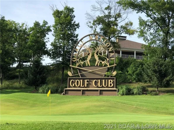 297 Quail Hollow Ave, Lake Ozark, MO 65049