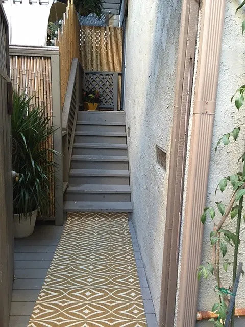 Gated charmng entrance...with area for BBQ!