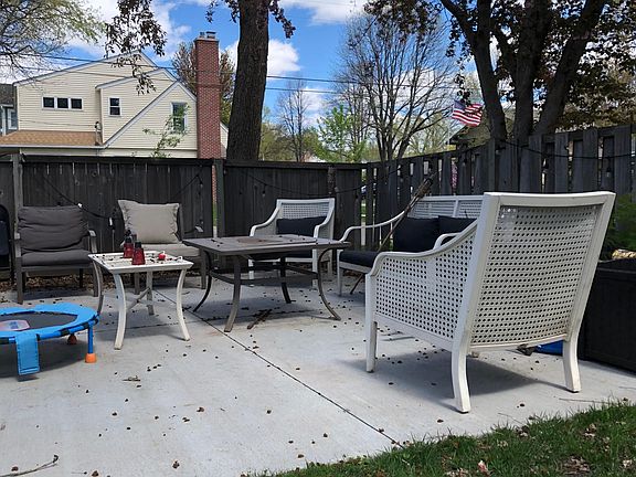 Fenced in yard with patio