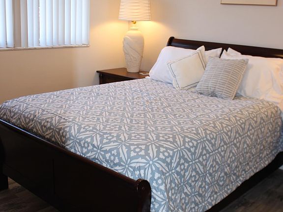 queen bed in bedroom