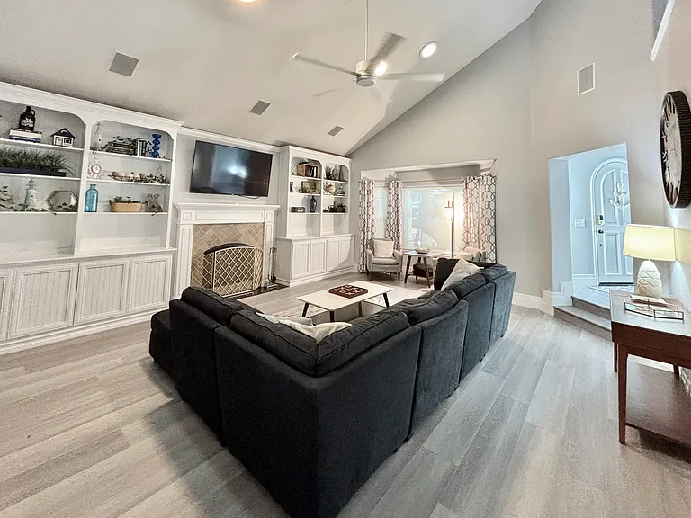 Living room with Chromcast connected TV and surround sound system