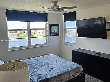 Master bedroom overlooking lake with extra large windows
