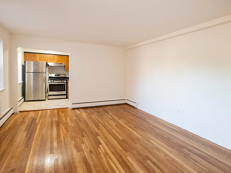 Step into the modern elegance of Dorchester House Apartments. This spacious layout boasts gleaming hardwood floors and a fully equipped kitchen, perfect for your culinary adventures. Explore your new home today!