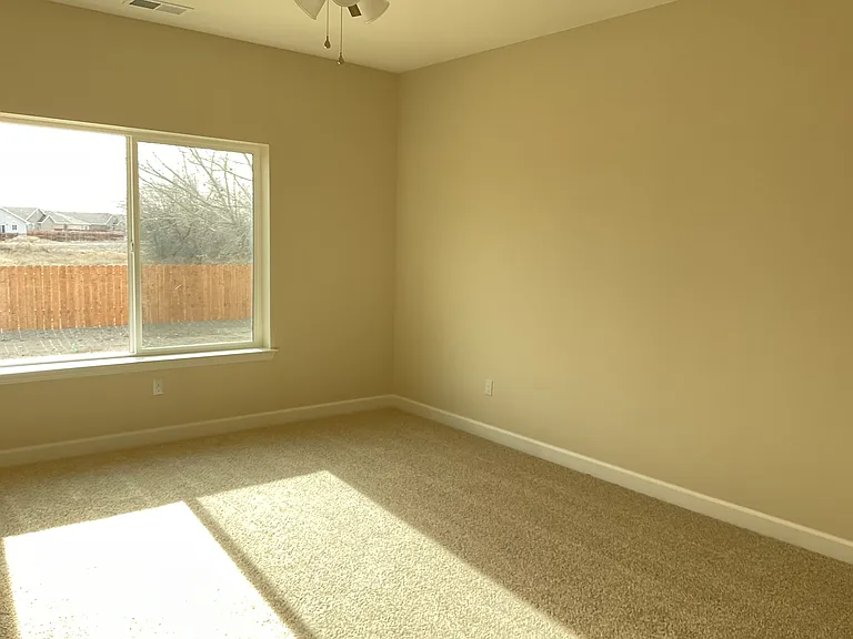 Master bedroom, view to backyard