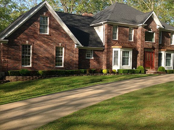 Front with circle driveway