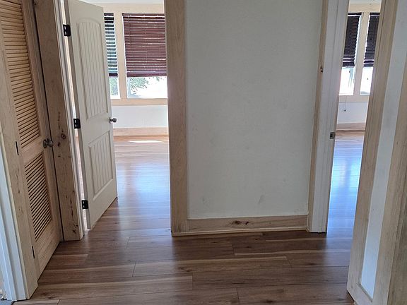 Hallway leading to both bedrooms