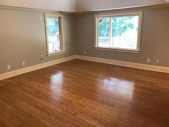 Large, open floor plan with lots of natural light. Large plate-glass window overlooking deeply wooded, private lot. You will feel like you are out hiking in nature!