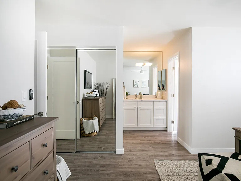Park View on Yukon furnished bedroom with mirror closet and bathroom