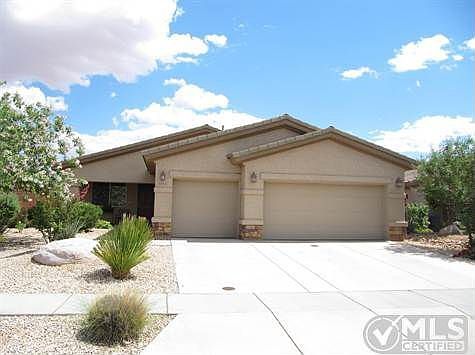 HOUSE FRONT W/3 CAR GARAGE