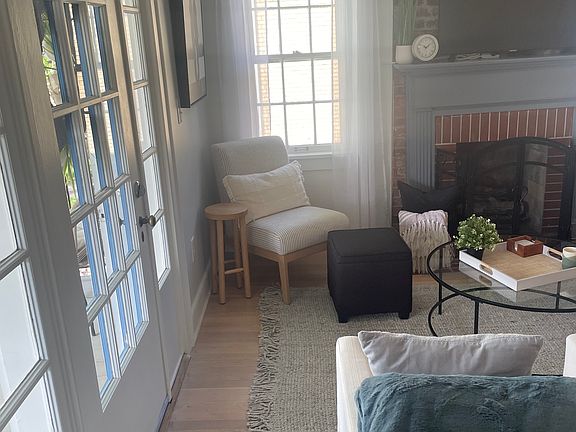 These glass doors lead to the front porch.