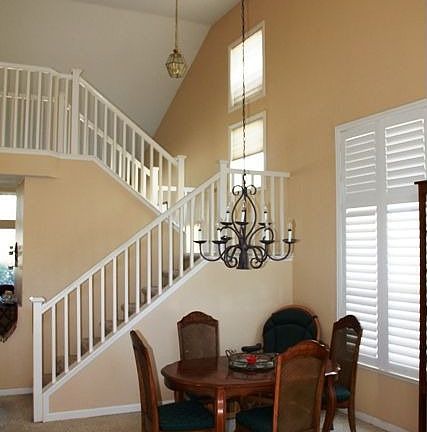 formal dining room and staircase