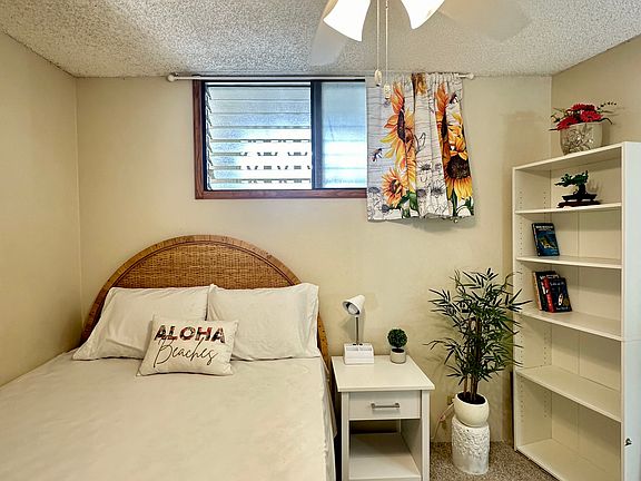 The room has a queen-size bed with 2 set of linens provided, and a brand new night stand.