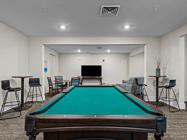 Active Adult clubhouse space with pool table