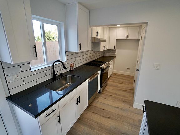 5th image of 6702 Saint Clair Ave