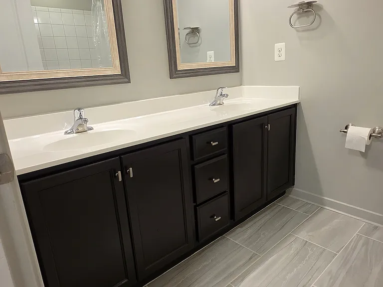 Full bath with double vanity located on third floor