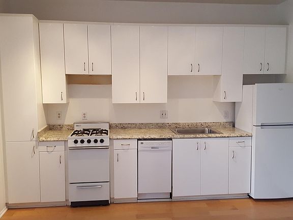smilar kitchen w/ stove, frig, dishwasher, disposal