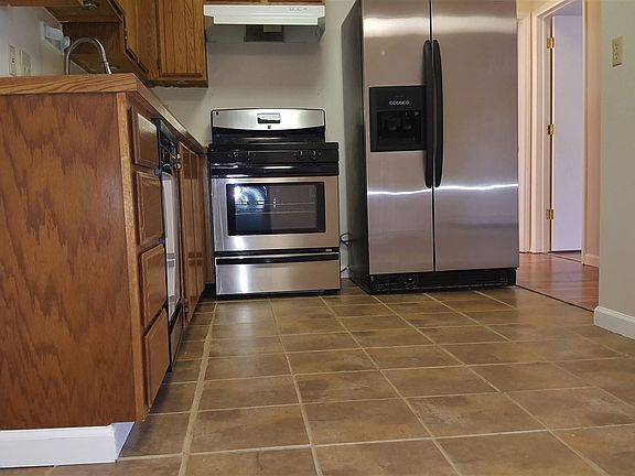 Open Kitchen with Tile Floors