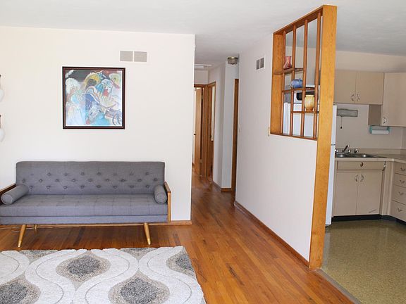 Living room, hallway, and kitchen.