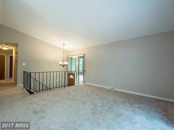 Vaulted ceiling adds openness to entry way
