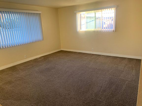Large living room. Recently installed new windows