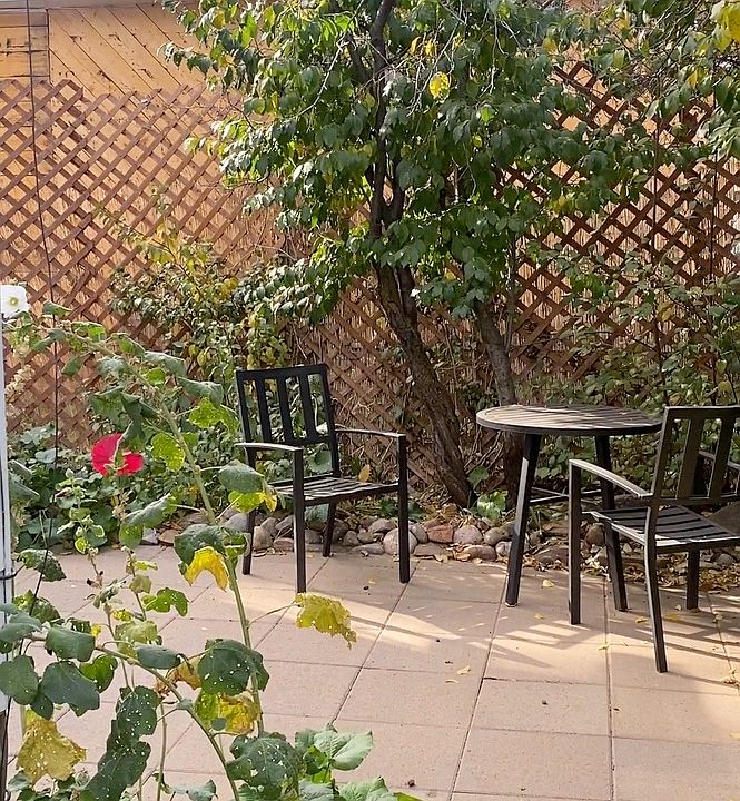 Fully fenced back yard is entered from the private free off street parking on my property.