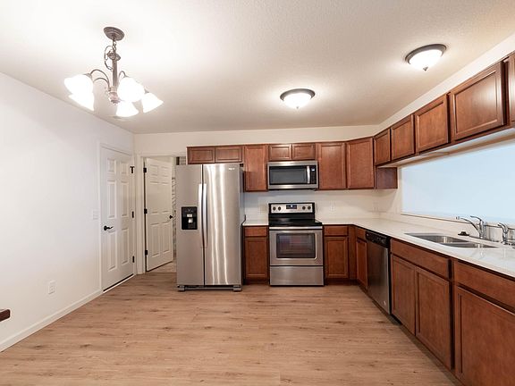 Kitchen with all appliances, stone countertop, and upgraded cabinets!
